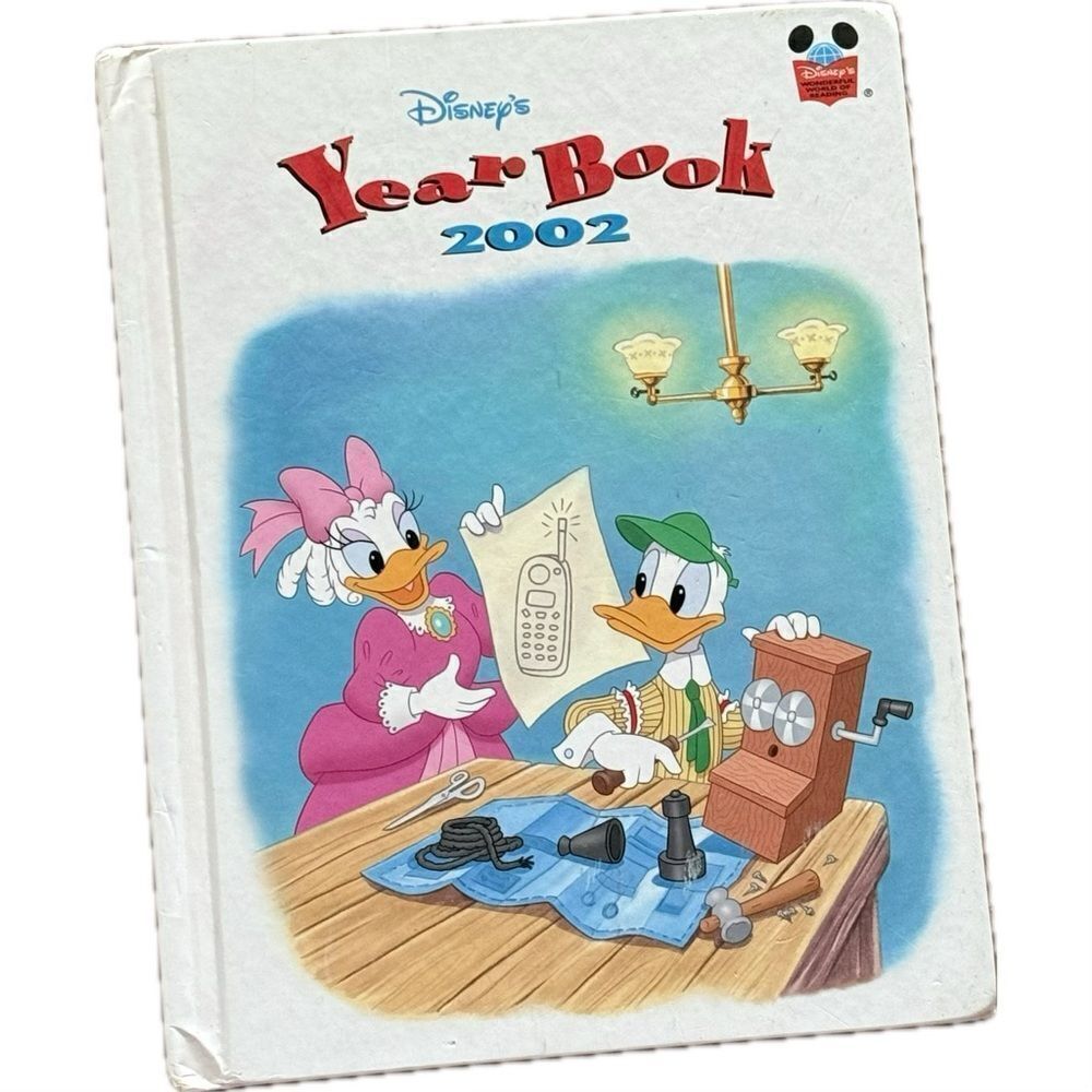Disney's Year Book 2002 Collectible
Hardcover Storybook w/‎ Poster